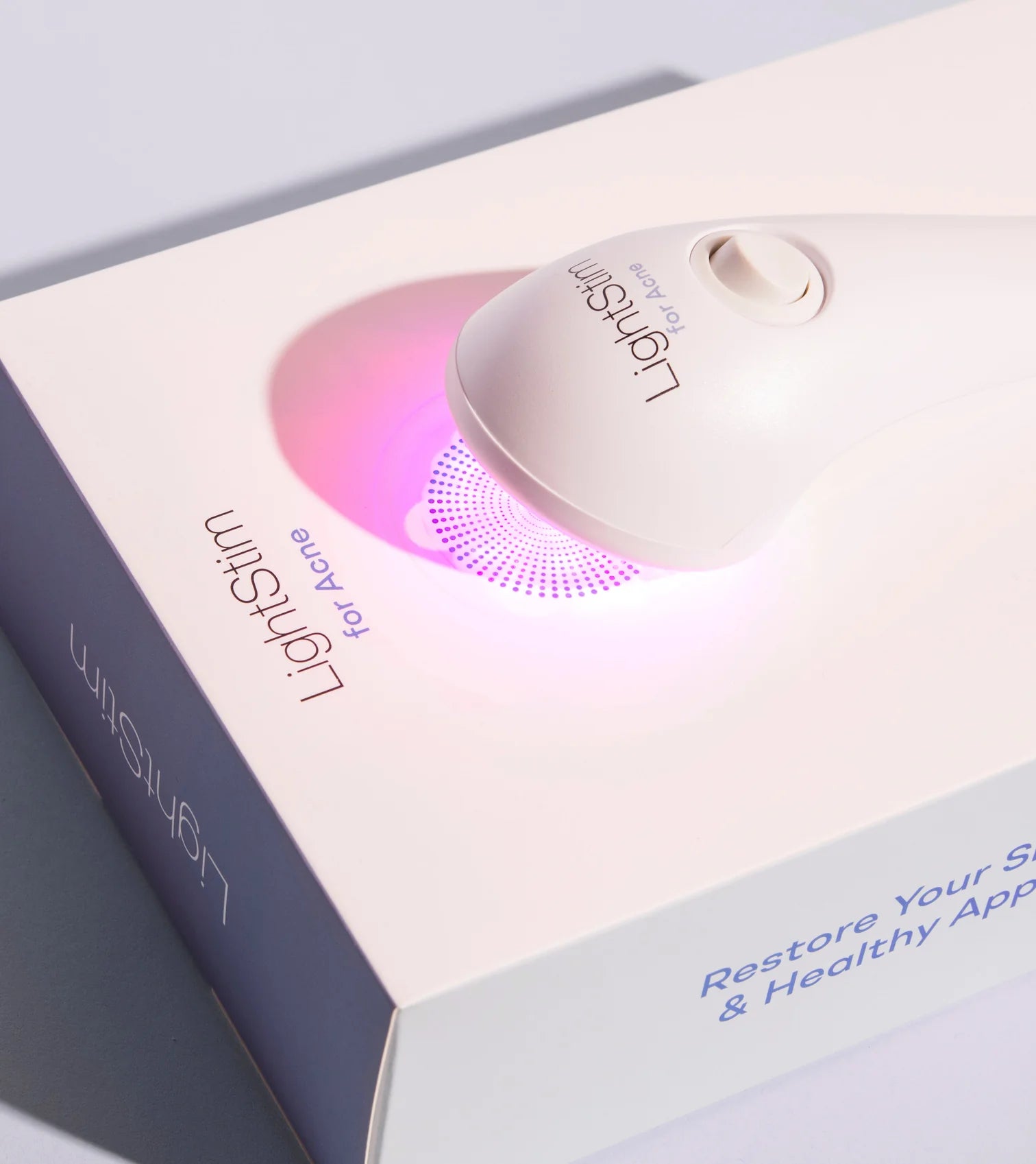 LightStim for acne blue light device and box